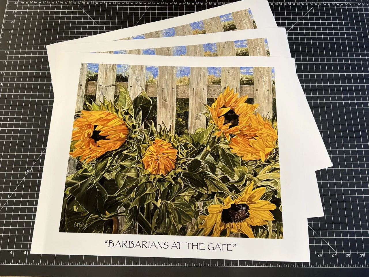 painting of sunflowers in front of a white picket fence